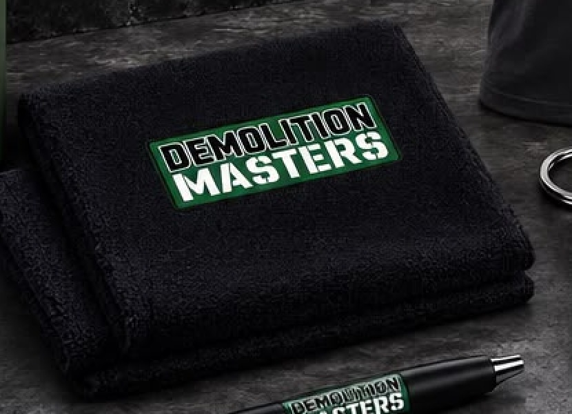 Demolition Masters branded gym towel from the merch bundle
